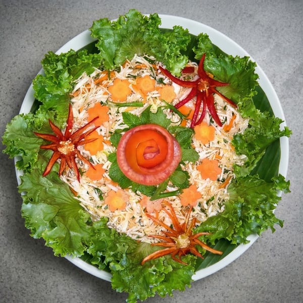 Miss Saigon Cafe's Vietnamese salad with shredded cabbage, carrots, herbs, and chili peppers.
